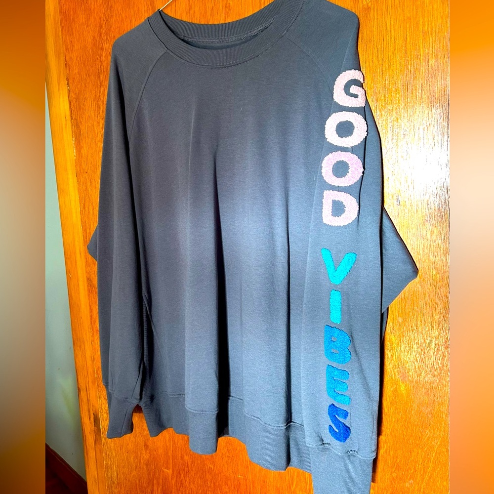 Large Rebellious One sweatshirt.  Good vibes